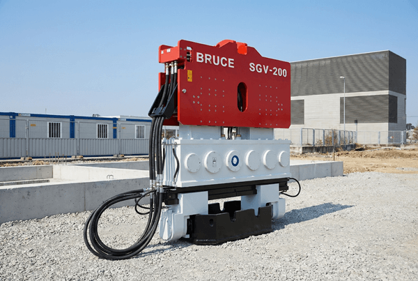 Excavator mounted vibratory hammer driving sheet piles into hard soil - Powerquip SGH Series