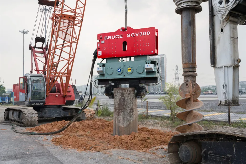BRUCE SGV300 vibro hammer working at a pile driving site